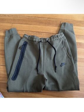 Nike Men's Olive Green Athletic Joggers with Zip Pocket